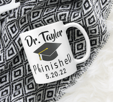 Load image into Gallery viewer, Personalized PHD Grad Mug With Graduation Cap - PhinisheD