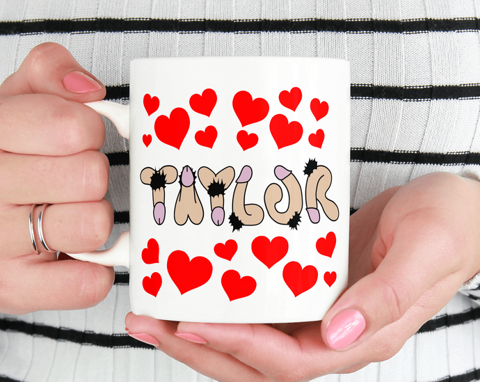 Penis font with hearts on a mug