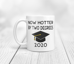Now hotter by two degrees graduation mug